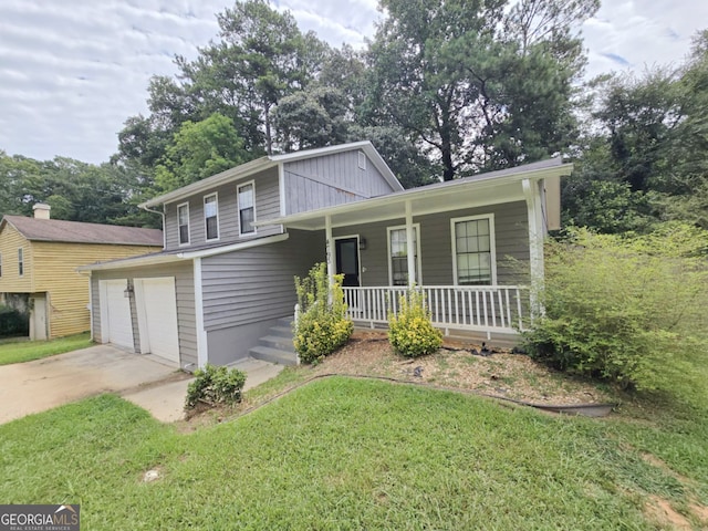 tri-level home with a front yard and a porch