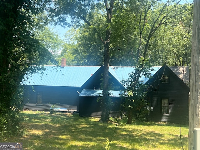 exterior space with a lawn