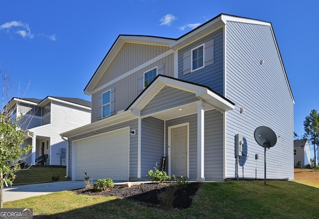 view of property with a front yard and a garage