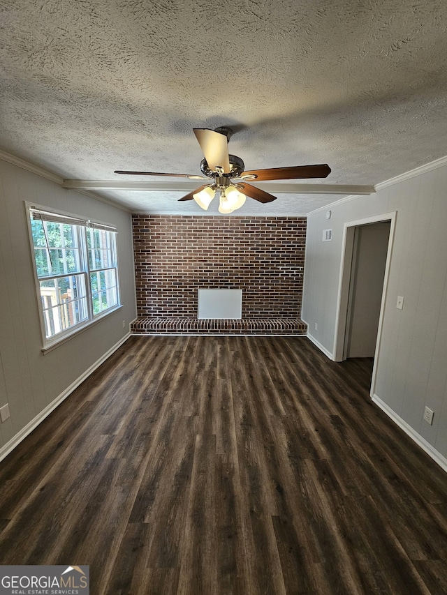 unfurnished room featuring ornamental molding, a textured ceiling, and brick wall