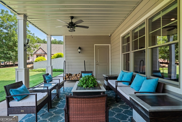 view of patio / terrace with ceiling fan and an outdoor hangout area