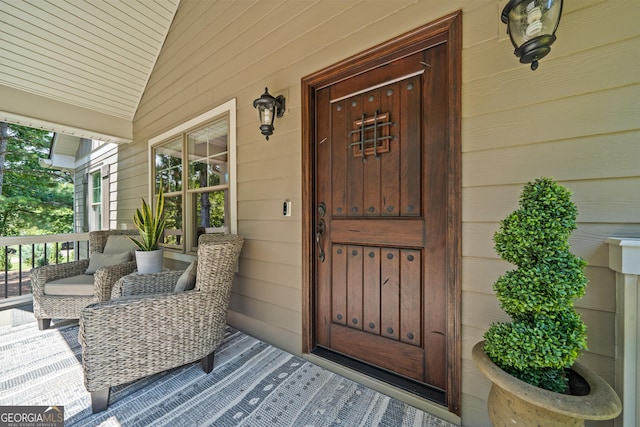 doorway to property with a porch