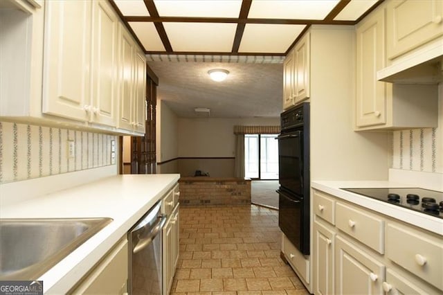 kitchen featuring black appliances and sink