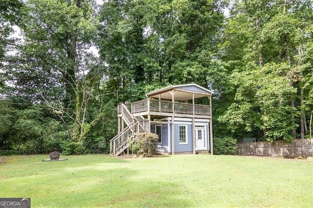 view of outdoor structure with a lawn