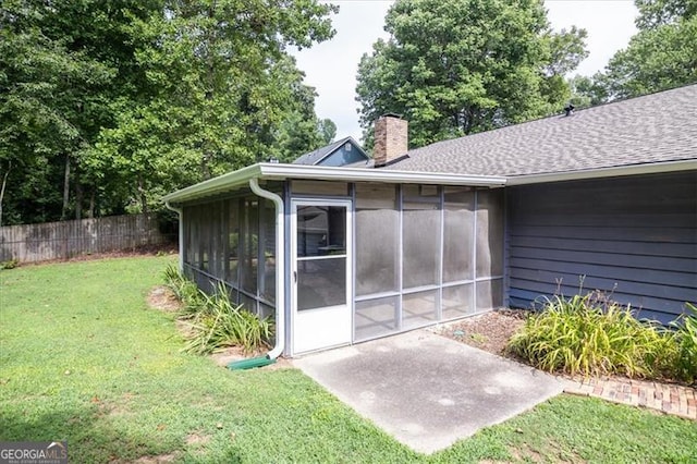 exterior space featuring a sunroom