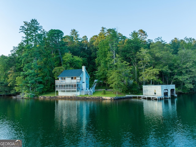 view of water feature with a dock