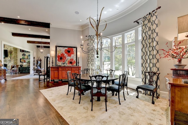 962 Chattooga Trce, Suwanee, GA 30024 - dining room featuring a chandelier, wood finished floors, beam ceiling, ornamental molding, and recessed lighting