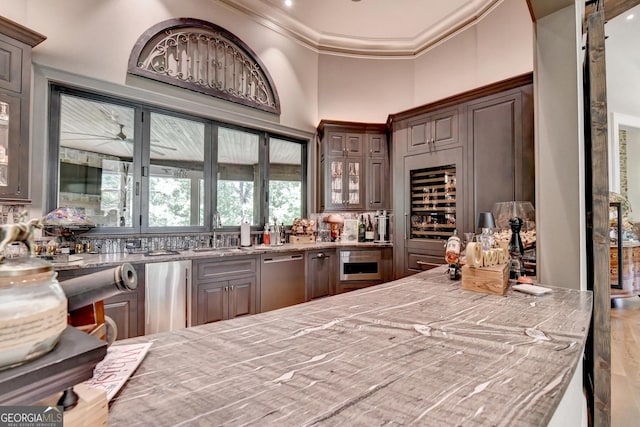 962 Chattooga Trce, Suwanee, GA 30024 - bar with dishwasher, ornamental molding, beverage cooler, and wood finished floors