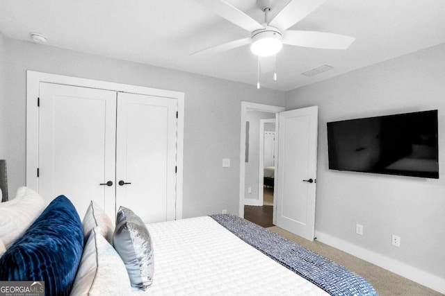 bedroom featuring a closet, carpet floors, and ceiling fan