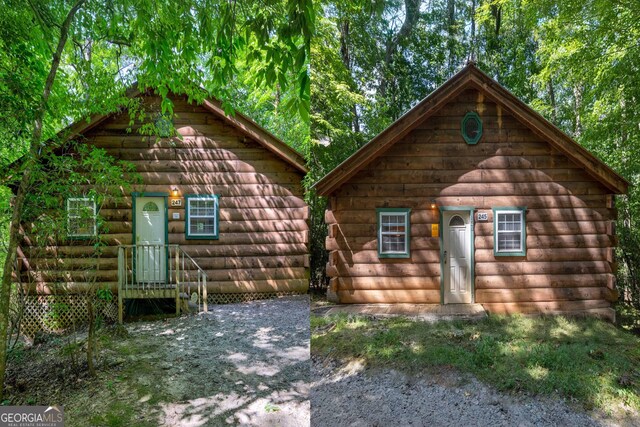 view of front of property with an outdoor structure