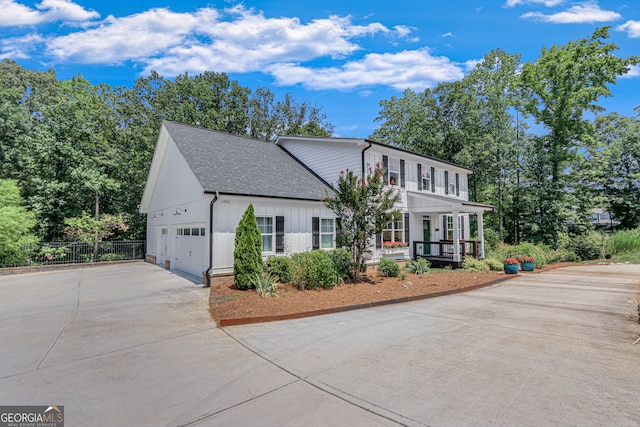 view of front of property featuring a garage