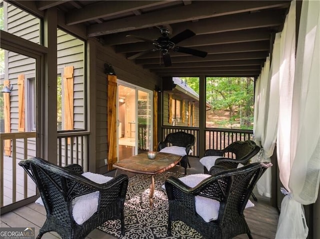 wooden deck with ceiling fan