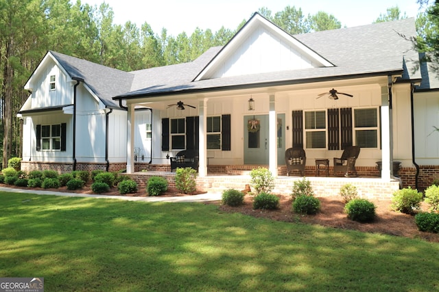 modern inspired farmhouse with a porch, roof with shingles, ceiling fan, and board and batten siding