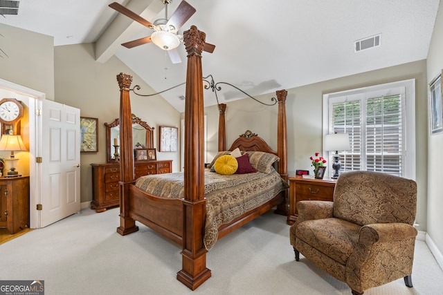 bedroom with light colored carpet, visible vents, and vaulted ceiling with beams