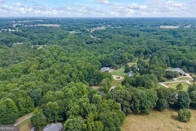 aerial view with a wooded view