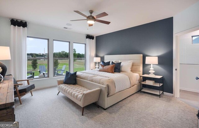 carpeted bedroom featuring ceiling fan