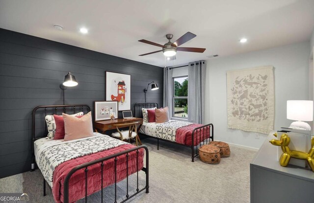 carpeted bedroom with ceiling fan