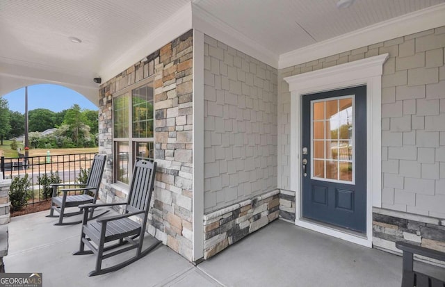 entrance to property with a porch