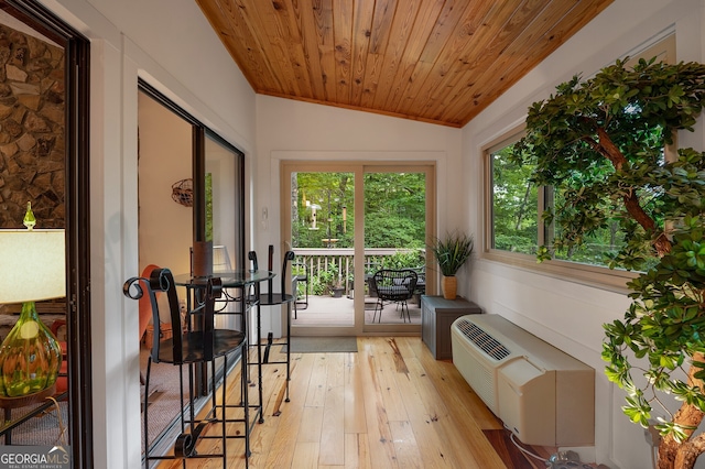 sunroom / solarium with wooden ceiling and lofted ceiling