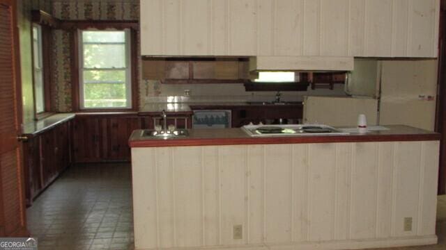 kitchen with sink and stainless steel gas cooktop