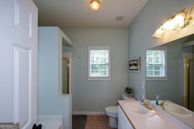 bathroom with a stall shower, visible vents, and plenty of natural light