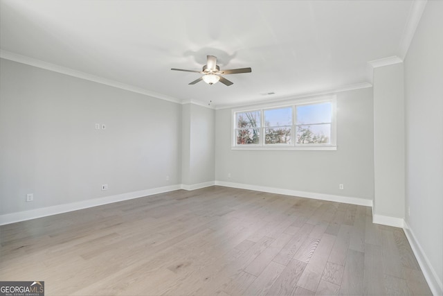 spare room with ceiling fan, light hardwood / wood-style floors, and ornamental molding