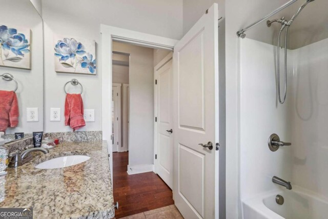 laundry room with washer and dryer and light tile patterned flooring