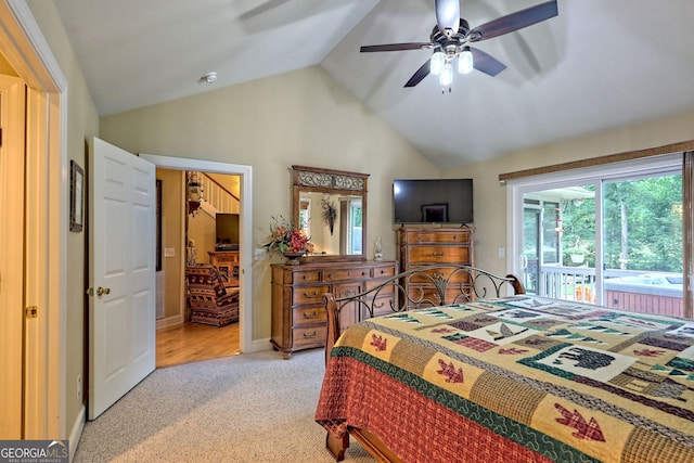 carpeted bedroom featuring lofted ceiling, ceiling fan, and access to exterior