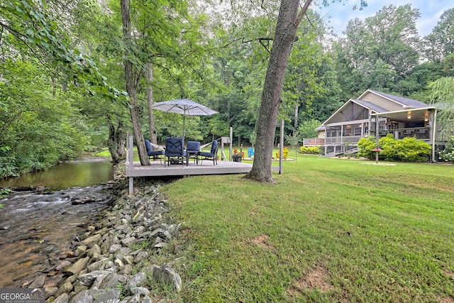 view of yard with a water view