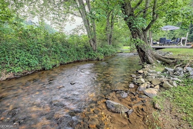 view of yard with a water view