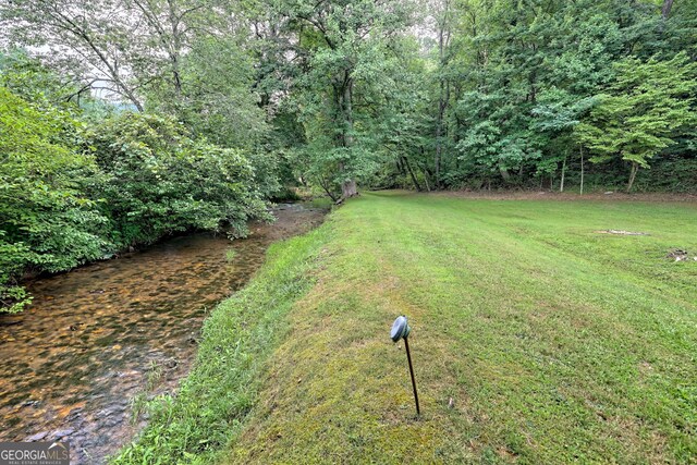 view of yard featuring a water view