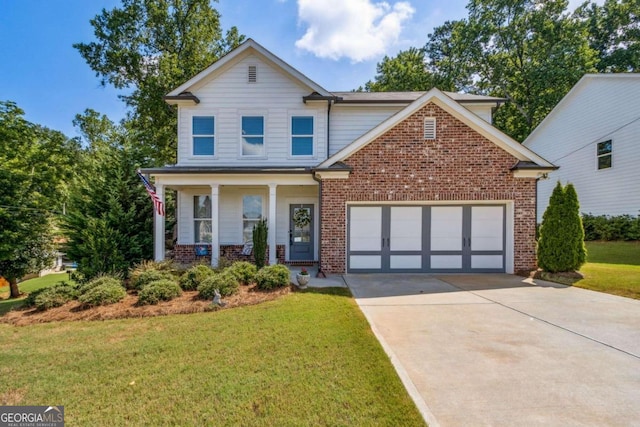 view of front of house with covered porch, a front yard, and a garage