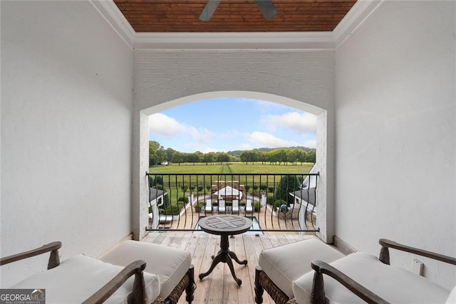 balcony featuring ceiling fan