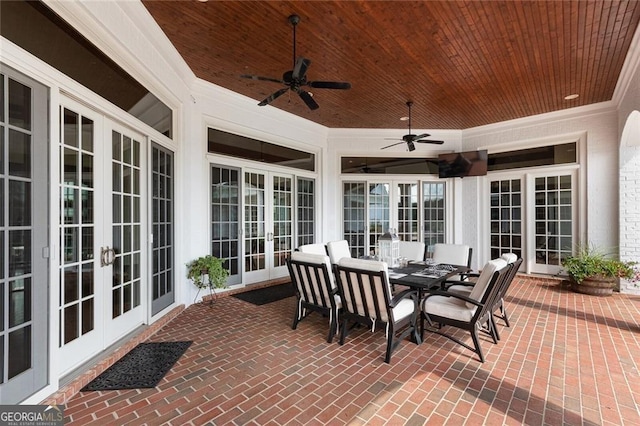 view of patio / terrace featuring ceiling fan, an outdoor living space, and french doors