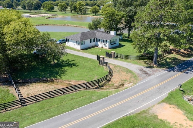 aerial view with a water view and a rural view