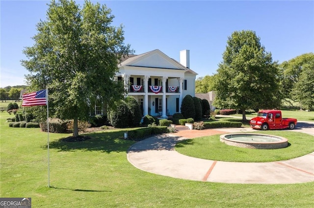 surrounding community featuring a yard