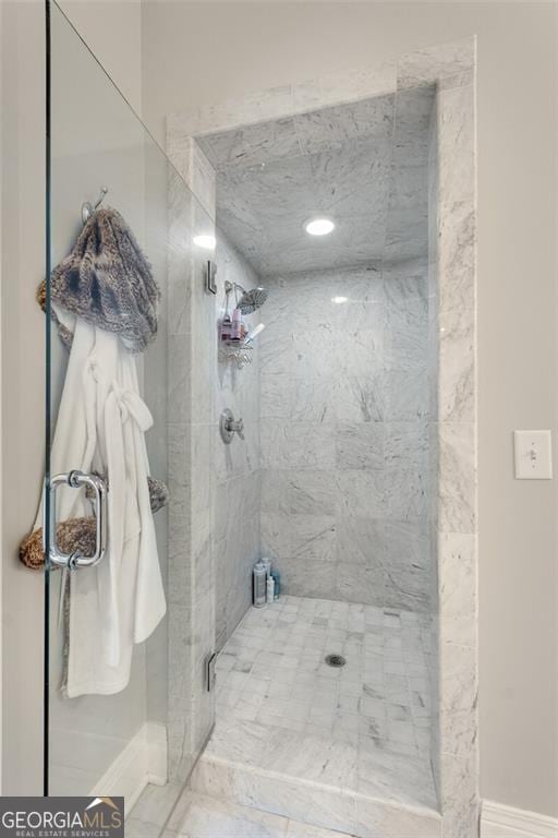 bathroom with an enclosed shower