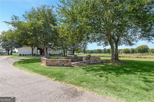 view of community featuring a lawn