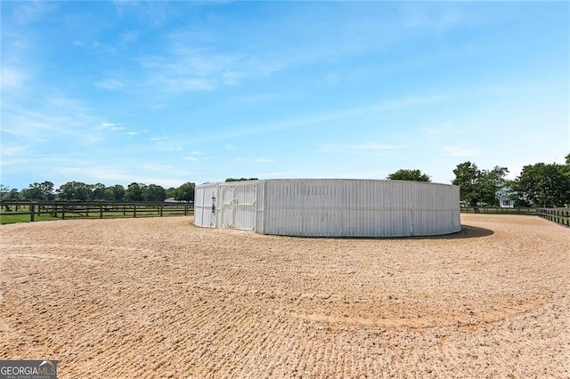 exterior space with a rural view