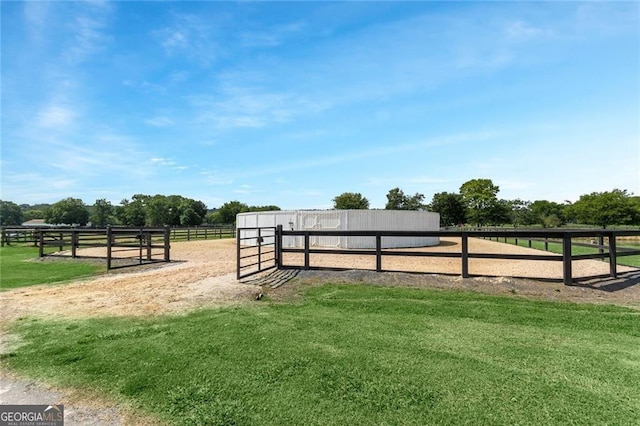 exterior space with a rural view