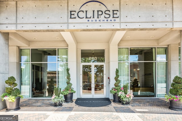 entrance to property featuring french doors