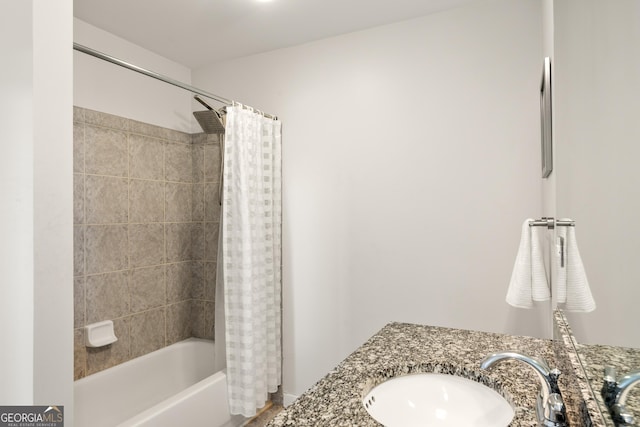 bathroom with vanity and shower / tub combo with curtain