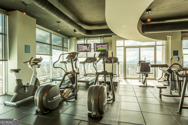 workout area with floor to ceiling windows