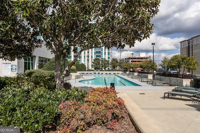 view of pool with a patio