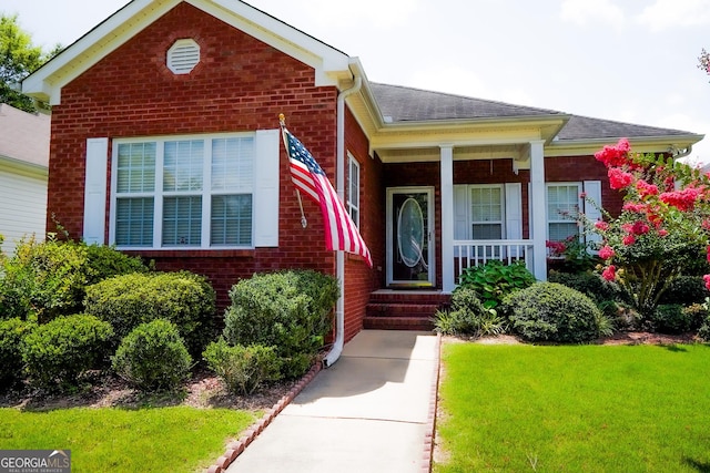 exterior space featuring a front lawn