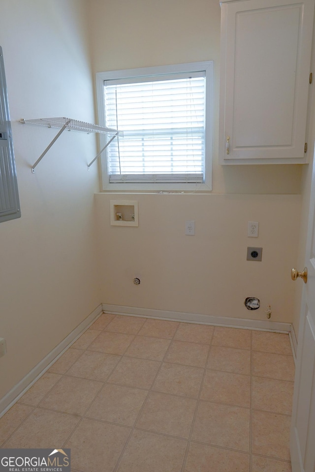 laundry area with washer hookup, cabinets, hookup for a gas dryer, and electric dryer hookup