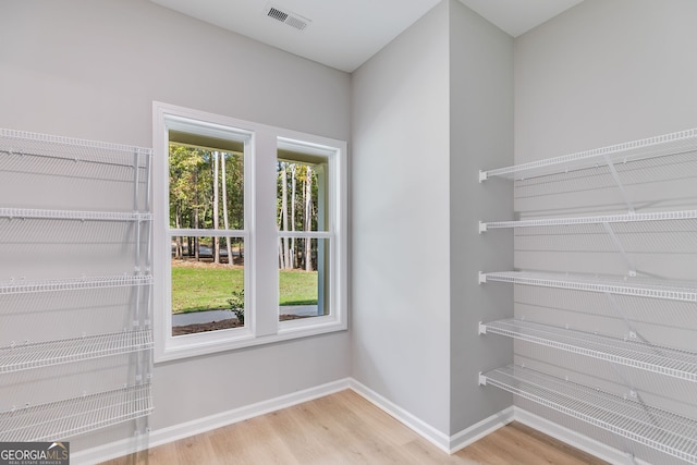 831 Banks Cir, Carrollton, GA 30116 - walk in closet with wood finished floors