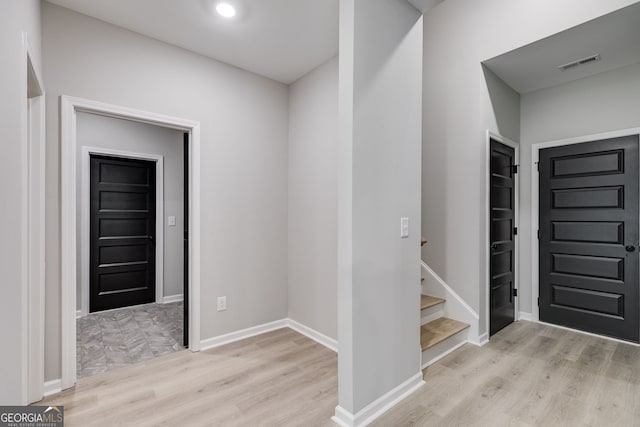 foyer entrance featuring light wood-type flooring