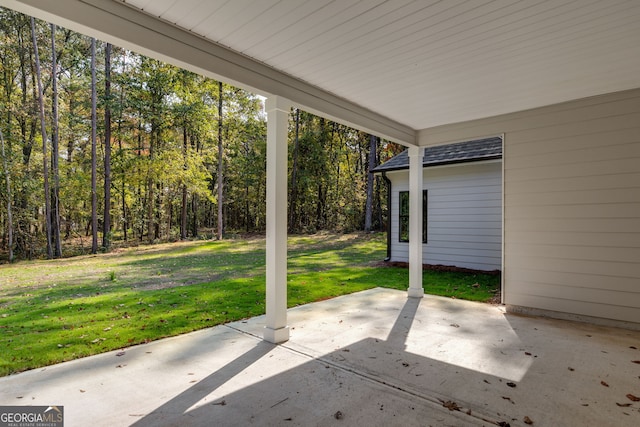 831 Banks Cir, Carrollton, GA 30116 - view of patio / terrace featuring a forest view