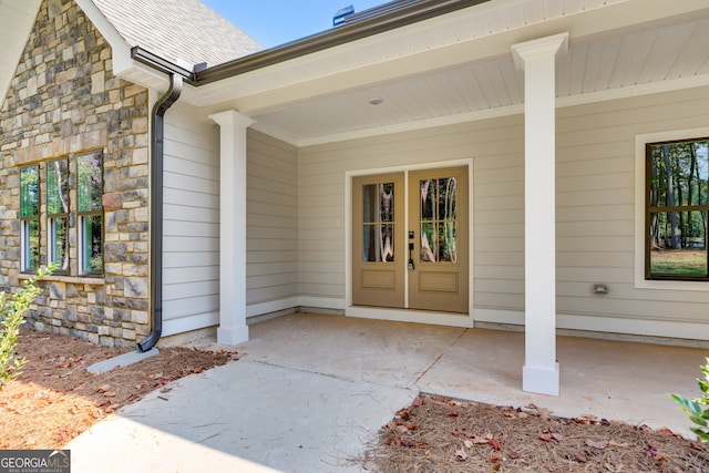 831 Banks Cir, Carrollton, GA 30116 - view of exterior entry with stone siding and french doors